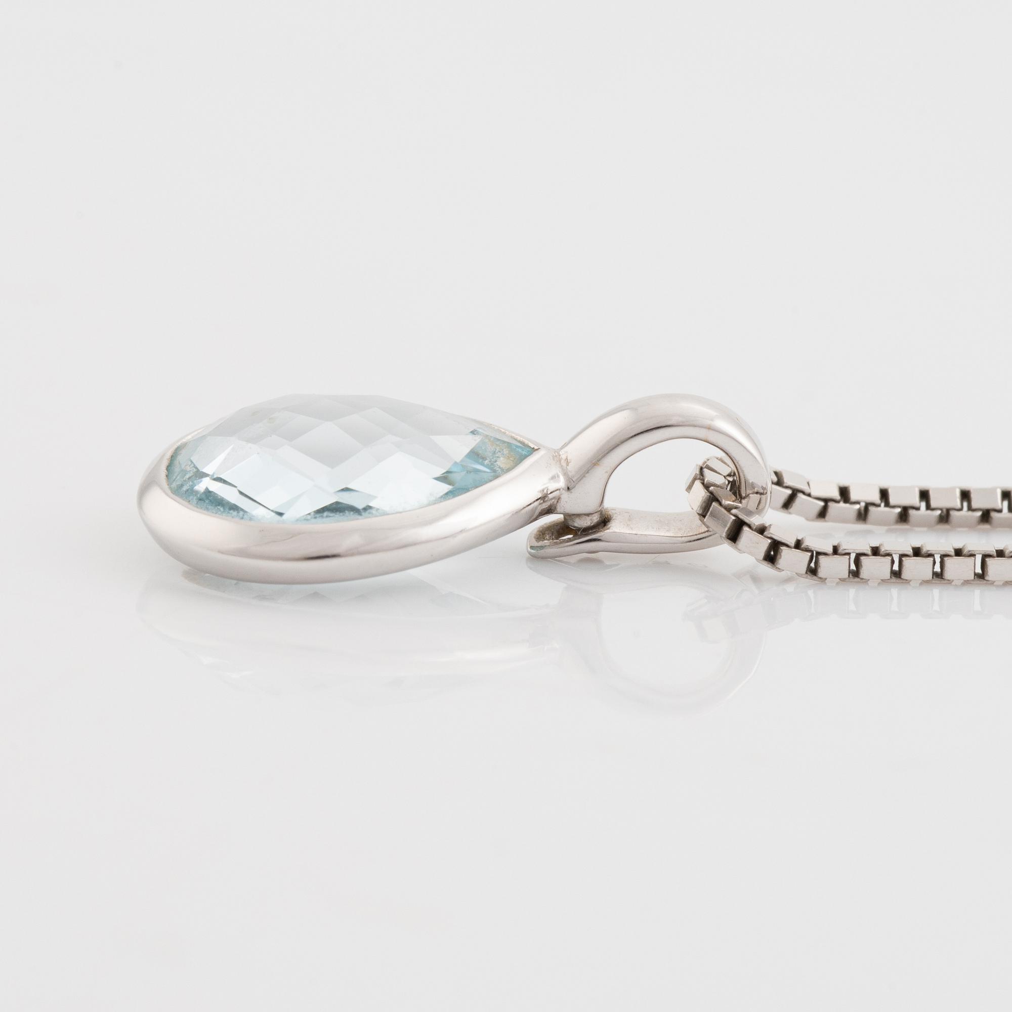 Pendant, Golden Lady, white gold with topaz.
