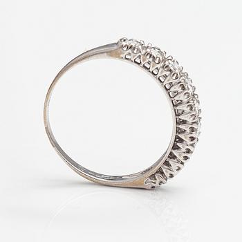 Sormus, 14K valkokultaa, timantteja n. 0.66 ct yht. Suomalaiset tuontileimat 1987.