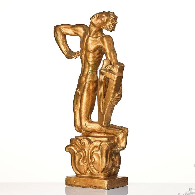 John Lundqvist, a gilded plaster sculpture of a lyre player, dated 1928.