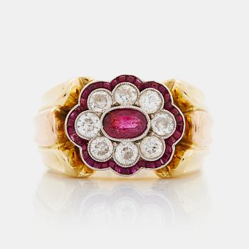 456. A WA Bolin ring in 18K gold set with rubies and round brilliant-cut diamonds.