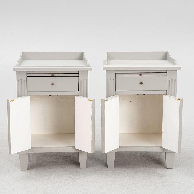 A pair of bedside tables, later part of the 20th century.