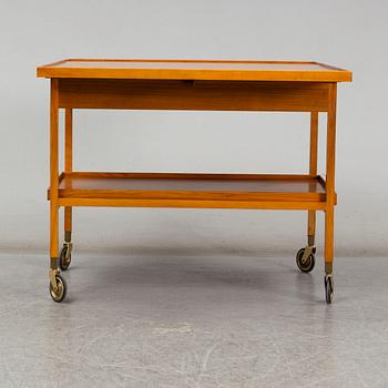 JOSEF FRANK, a walnut tea trolley model 470, Svenskt Tenn, Sweden.