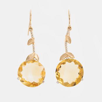 Large citrine and brilliant cut diamond earrings.