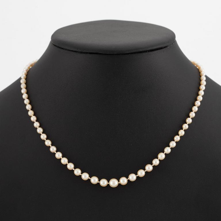 Necklace with cultured graduated pearls, white gold clasp with rose-cut diamonds.