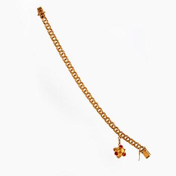 Armband, 18K guld, bismarcklänk med berlock.