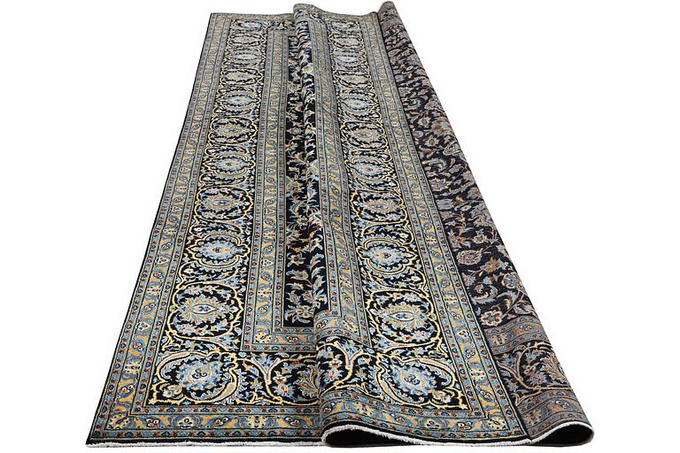 A carpet, Kashan, c. 385 x 252 cm.