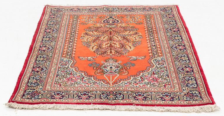 A Quum rug, ca 152 x 106 cm.