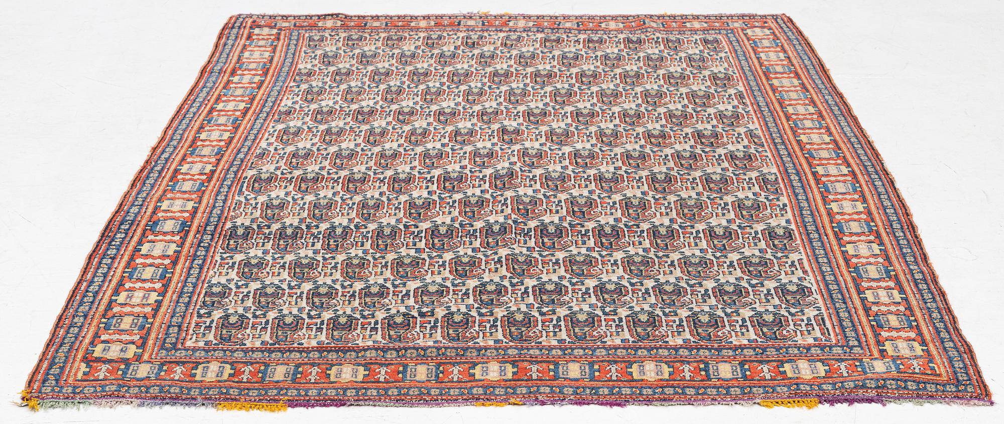 An antique Senneh rug, c 192 x 140 cm.