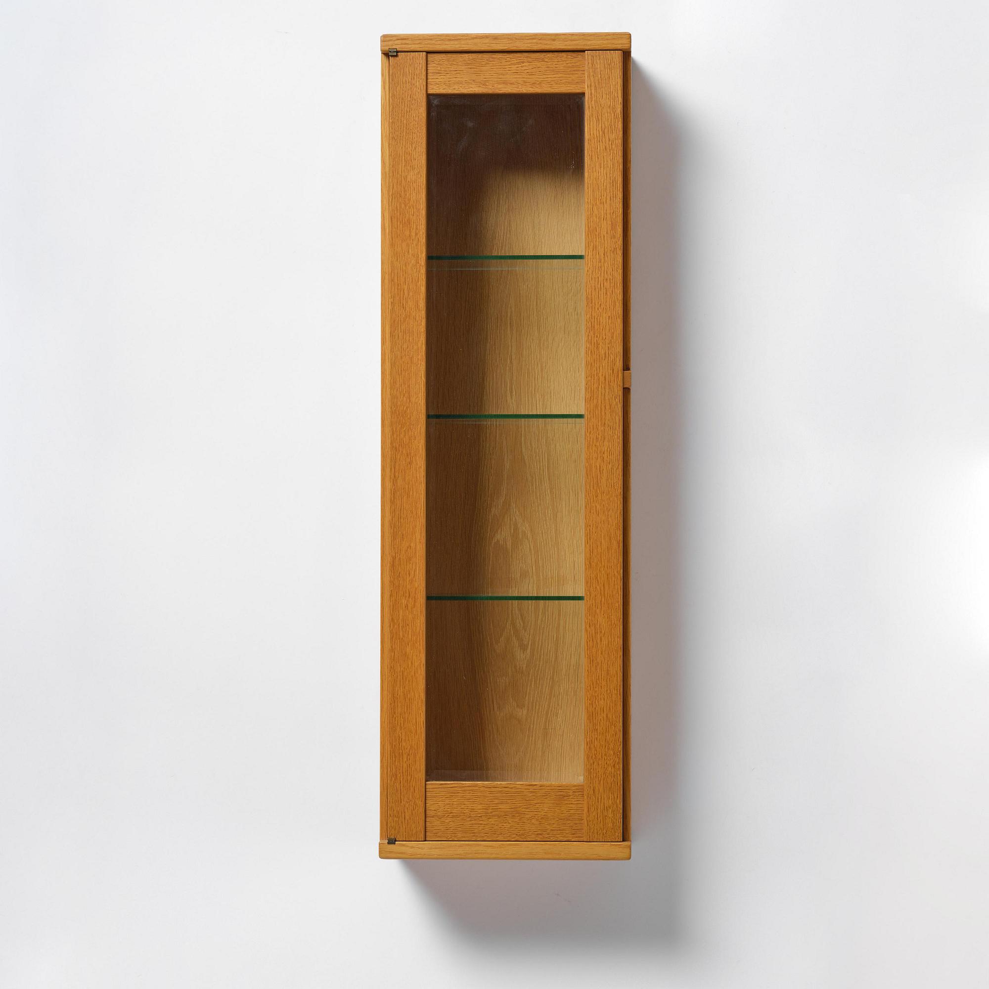 James Krenov, an oak or doussie showcase wall cabinet, executed in his own workshop, Bromma, Sweden.