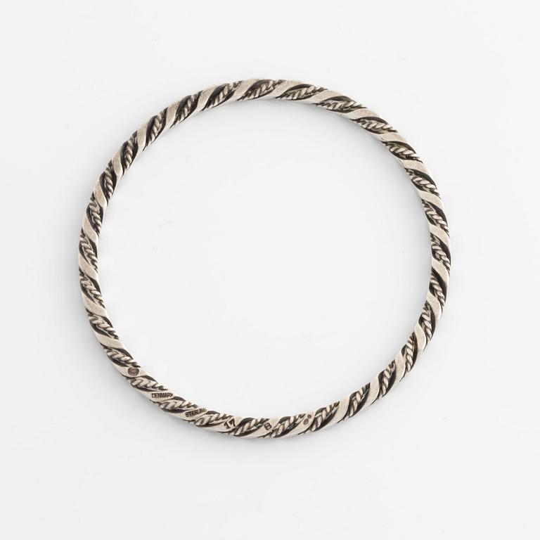 A Georg Jensen bangle in sterling silver.