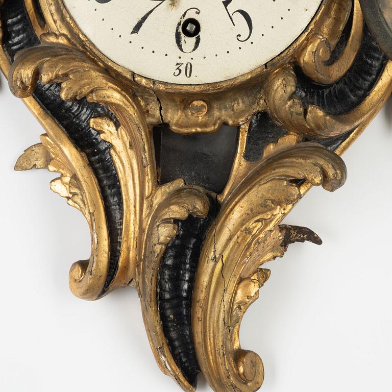 A Rococo wall clock, second half of the 18th Century.