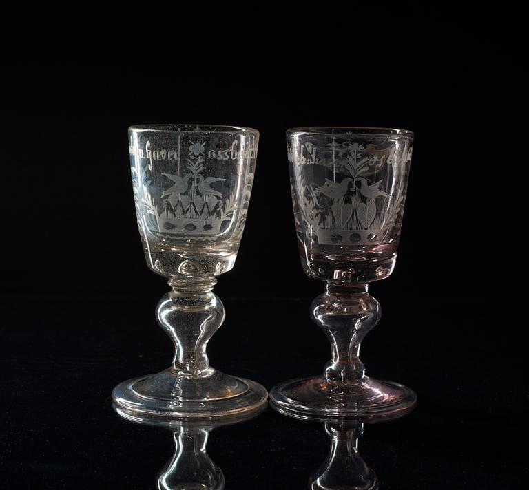 A set of two German engraved wedding goblets, end of 18th Century.