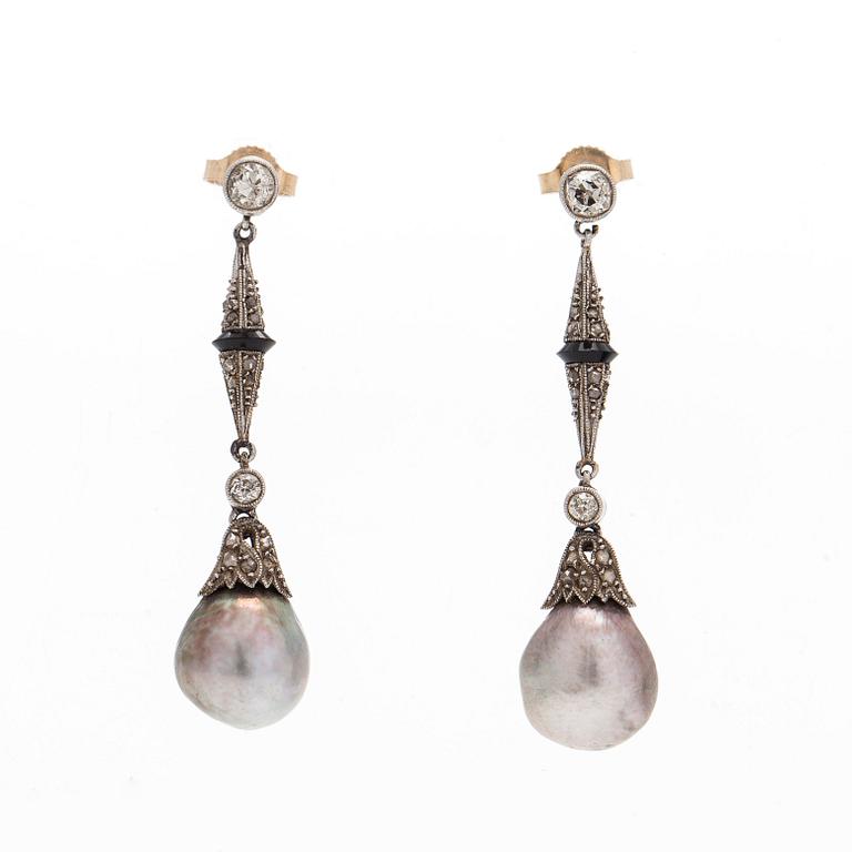 Earrings, diamonds, black stone and pearls.