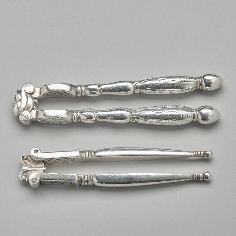 Georg Jensen, OCH JOHAN ROHDE, nötknäppare, 2 st, Firma Georg Jensen, Köpenhamn 1919-27, 830/1000.