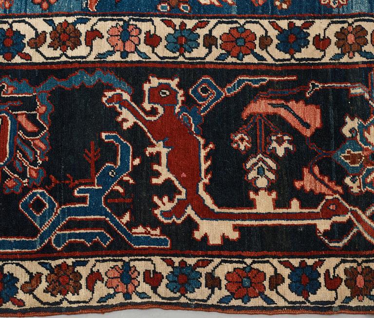 A CARPET, an antique Bakshaish, ca 693 x 398,5 cm, dated "1298"AH/1880 AD probably.