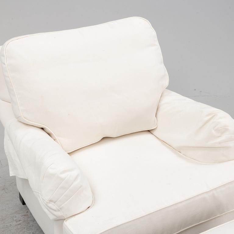 An easy chair with ottoman from Englesson, 21st century.