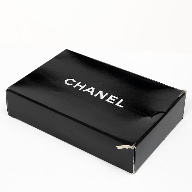 Chanel, A black leather vintage pouch, 1989-1991.