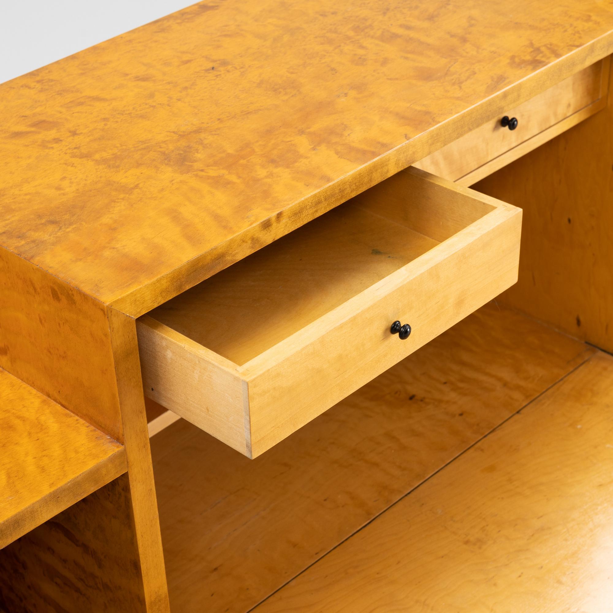 A 1930's birch veneered bookcase/sideboard.