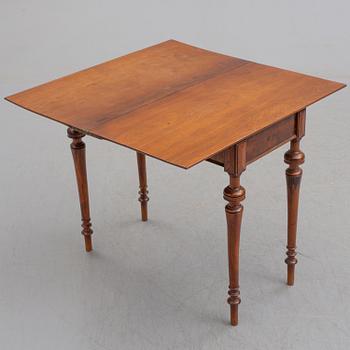 A late 19th century mahogany card table.
