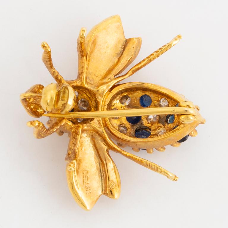 Gold brilliant-cut diamond and sapphire bee brooch.