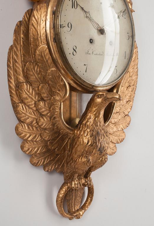 A Swedish Empire early 19th century wall clock by J. Cederlund, master 1799-1825.