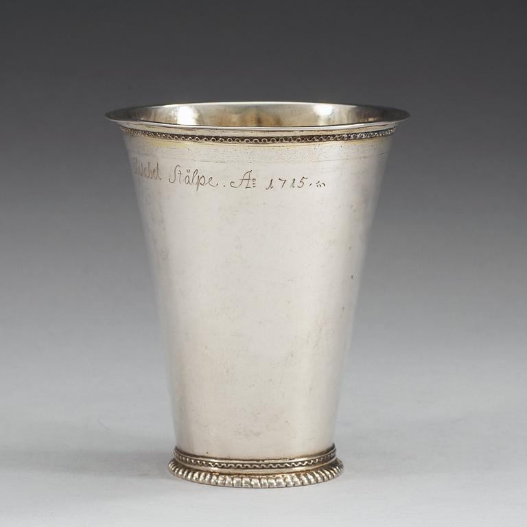 A Swedish early 18th century parcel-gilt beaker, makers mark of Hans Wiggman (Kalmar 1712-1761).