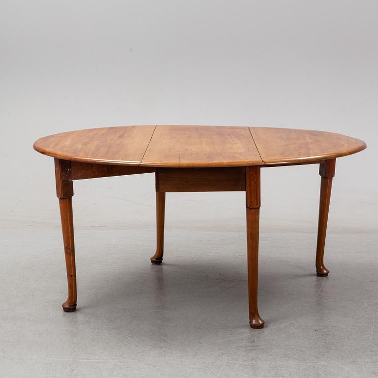 An end of the 19th Century mahogany drop leaf table.