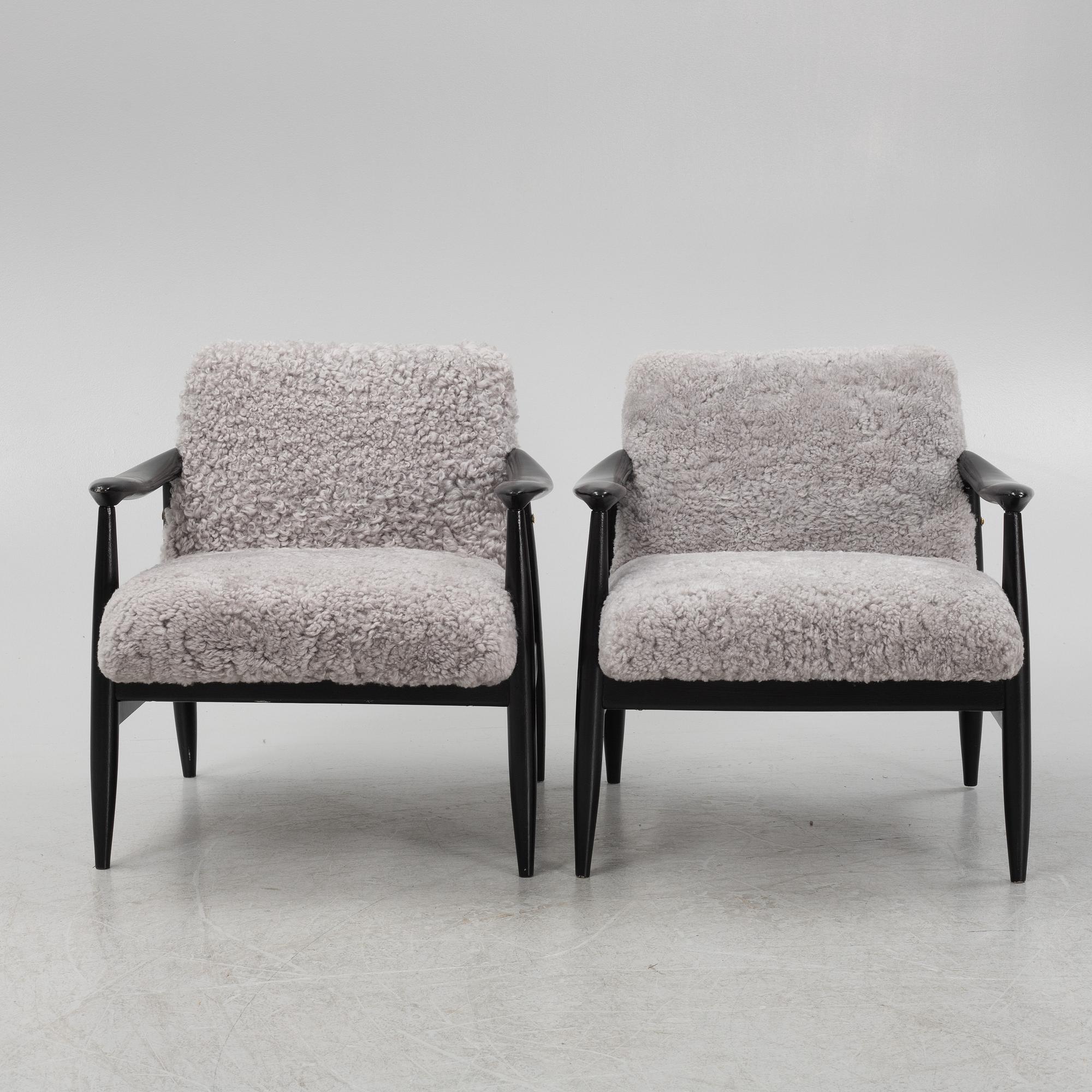 A pair of easy chairs, 1950's/60's.