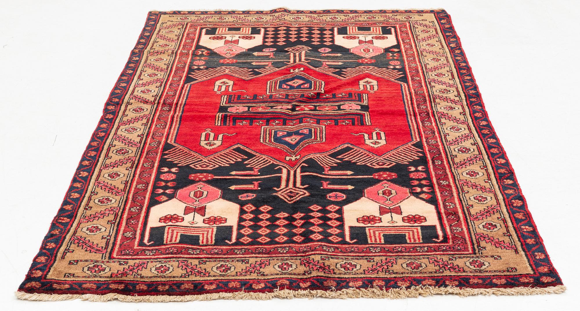 A west persian rug, ca 244 x 141 cm.