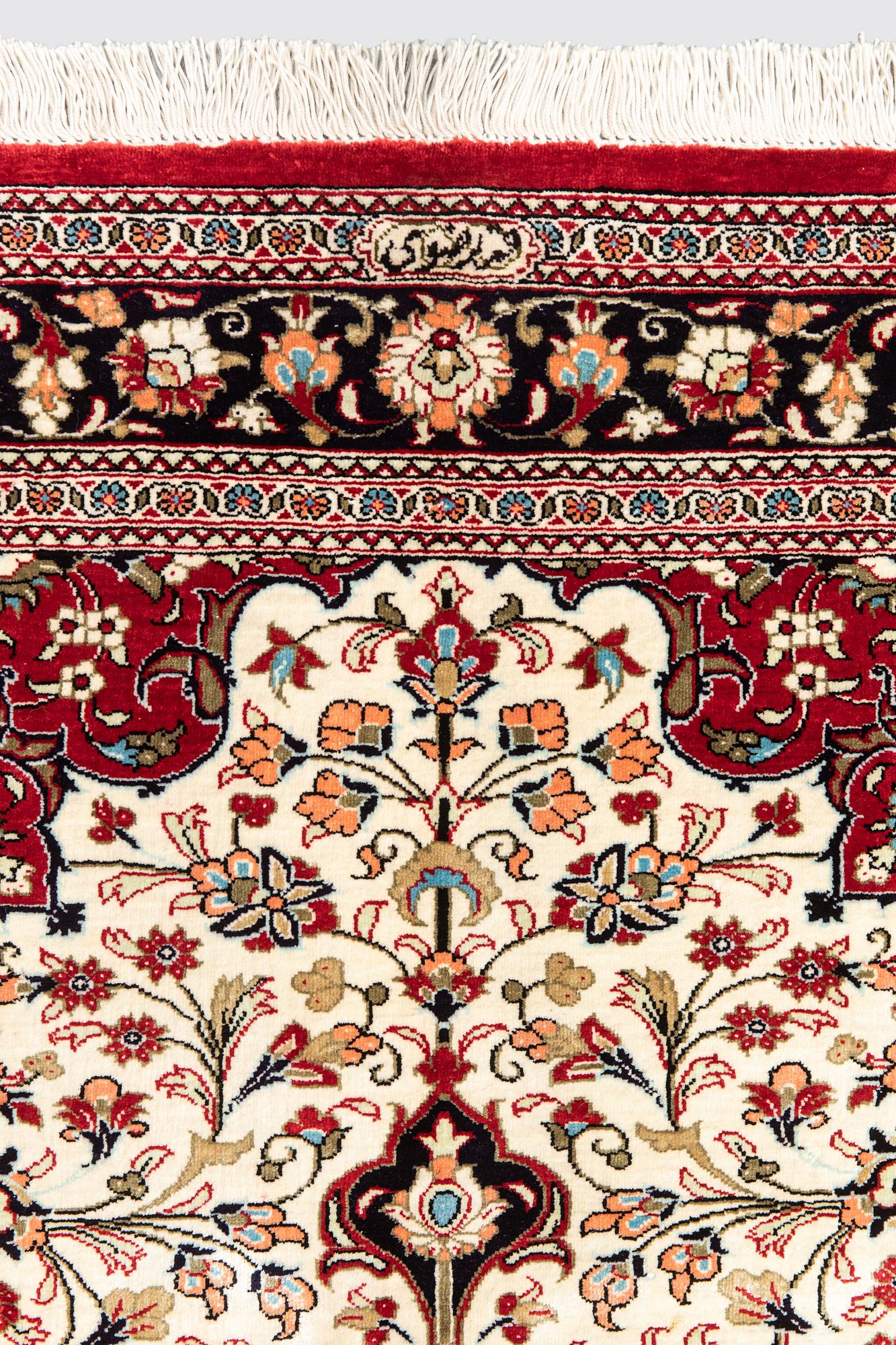 A carpet, Silk Qum, ca 116 x 75 cm.