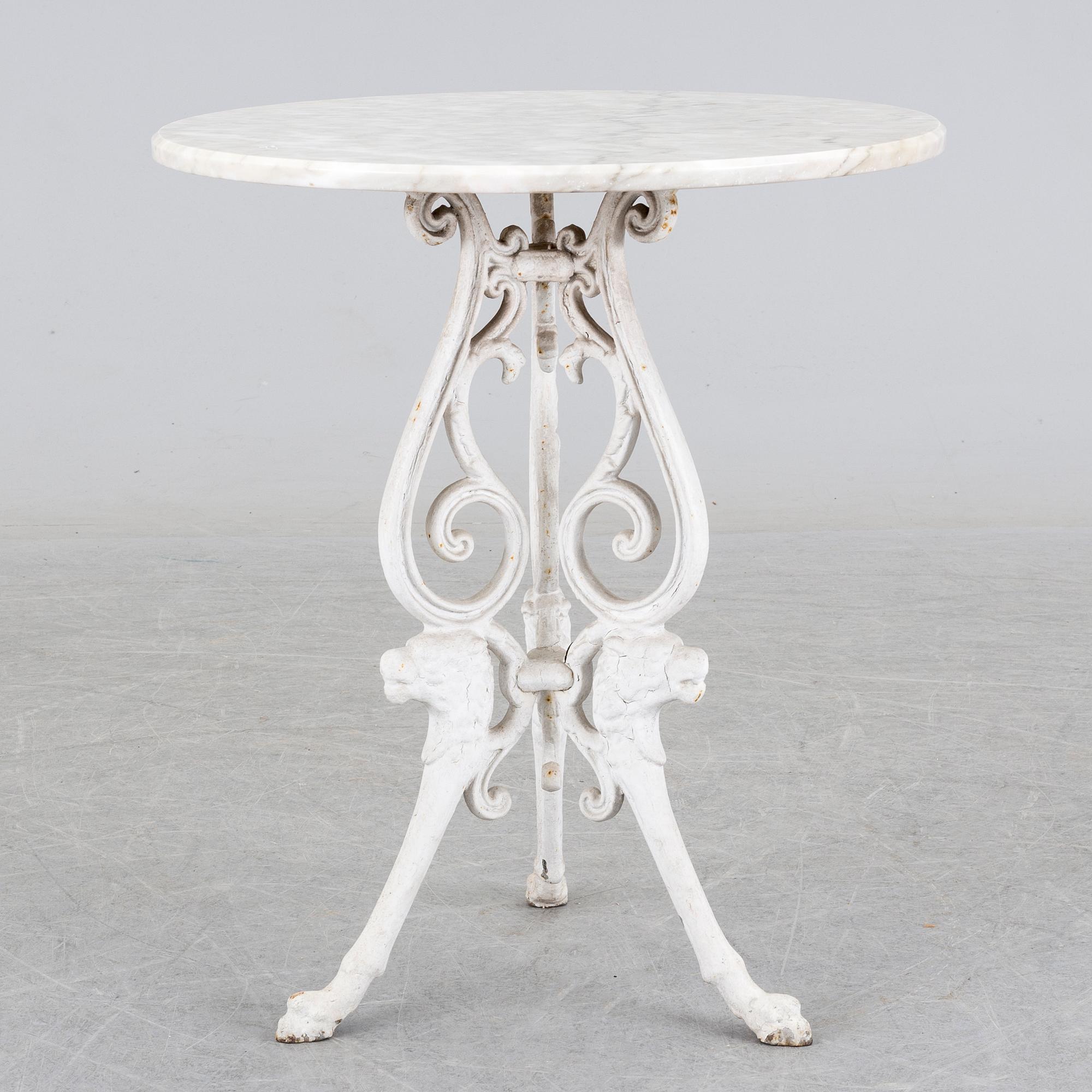 a late 20th century cast iron garden table.