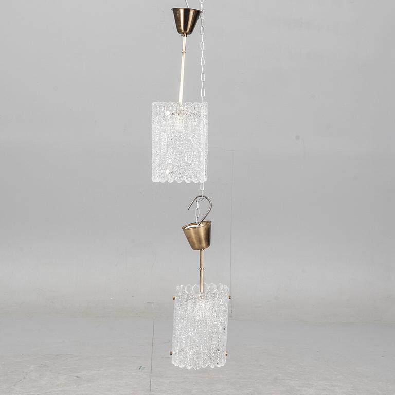 TAKLAMPOR, 2 snarlika. Glas, Carl Fagerlund, Orrefors. 1900-tal.