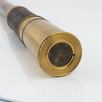 A brass telescope, around 1900.