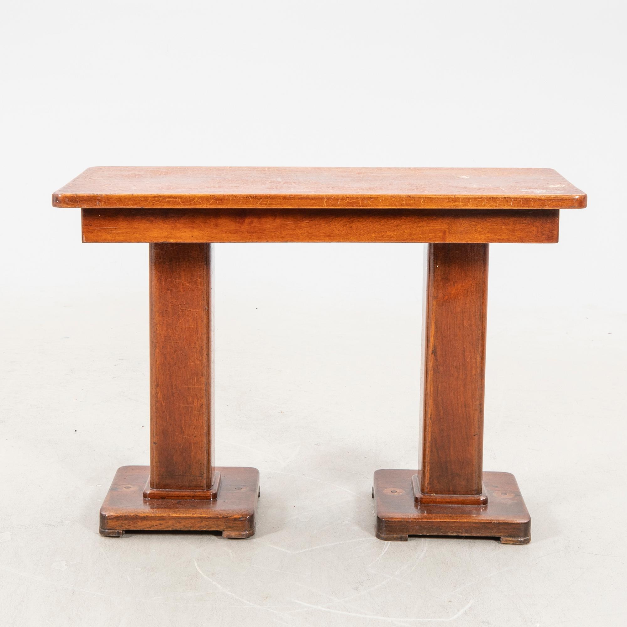 A set of table and two benches from a ship 20th century.