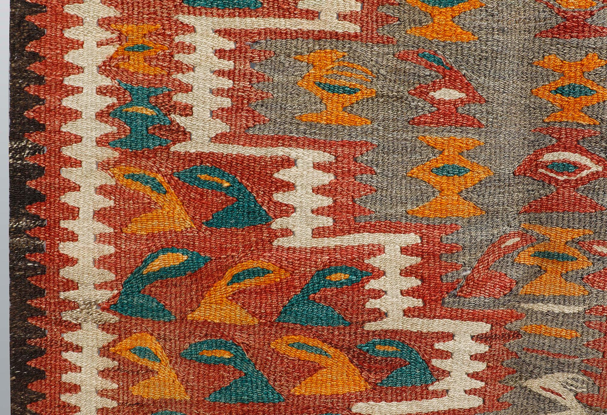 A Nomad Kilim rug, approx. 255 x 150 cm.