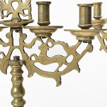 A pair of Baroque style brass candelabras, 20th century.