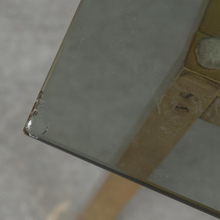 A 1960-70's brass and glass coffee table.