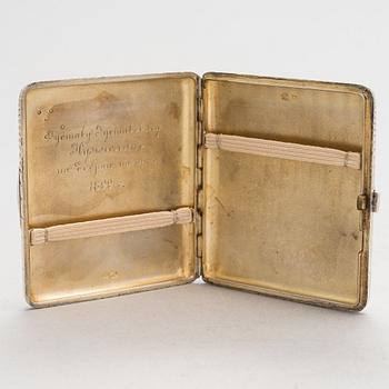 A silver cigarette case, maker's mark of Johan Allenius, Saint Petersburg, Russia 1898.