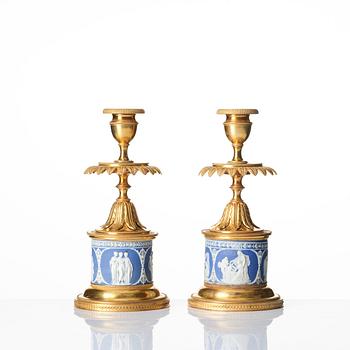 A pair of George III ormolu and jasperware candlesticks, late 18th century.