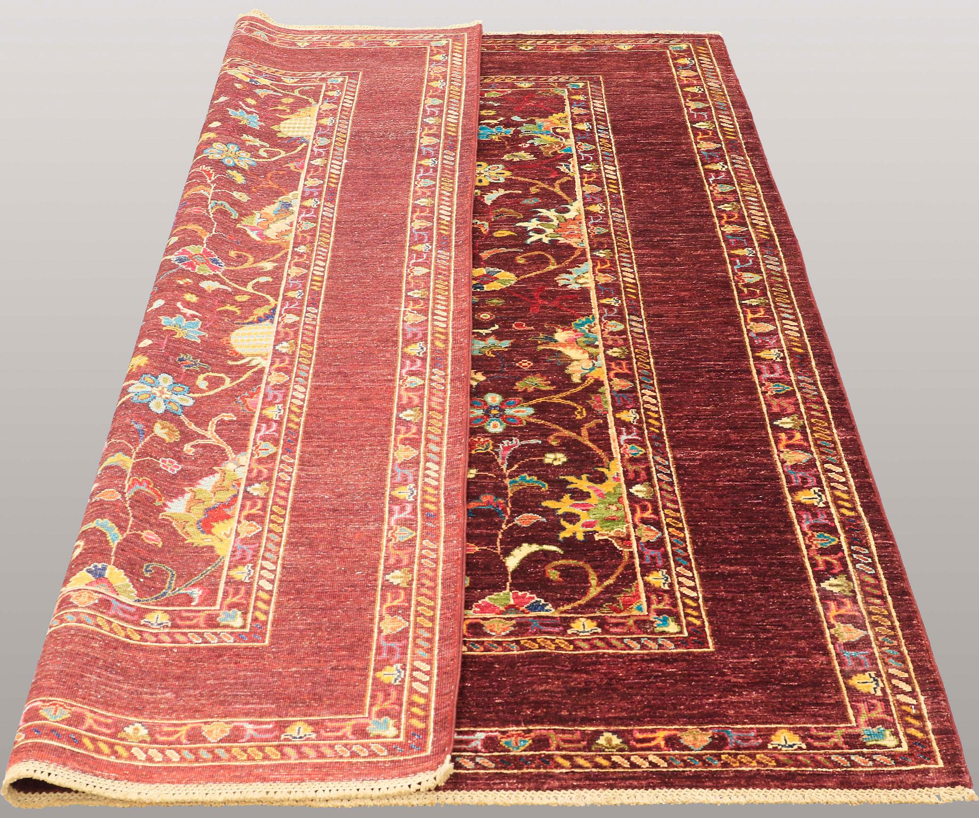 A carpet, Zeigler design, ca 244 x 177 cm.