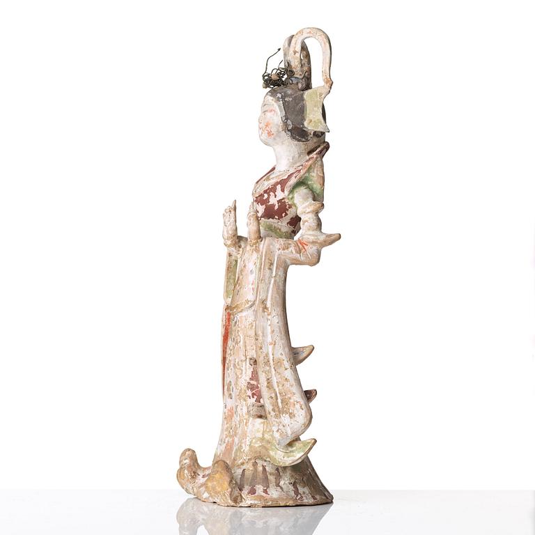 A elegant pottery figure of a court lady, Tang dynasty (618-907).