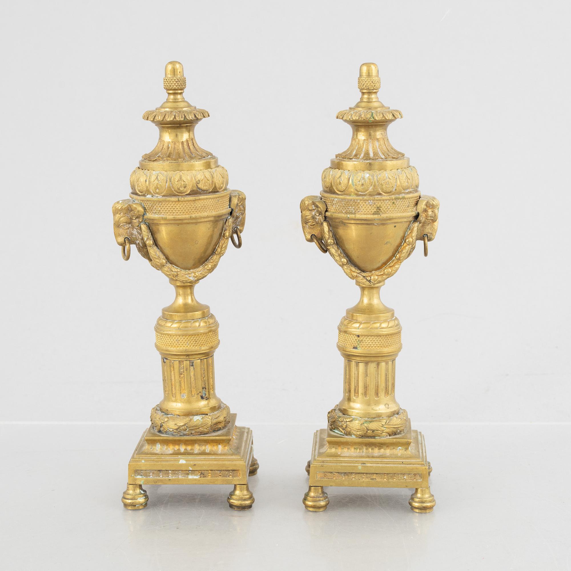 A pair of Louis XVI-style candlesticks, late 19th century.
