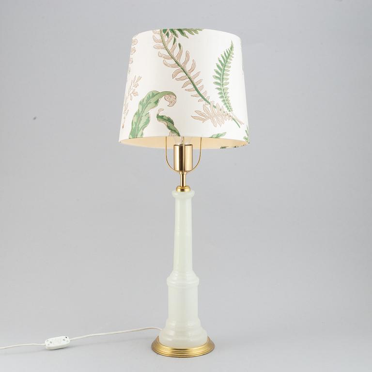 A brass and glass table lamp with lamp-shade. Svenskt Tenn, model no. 2583.