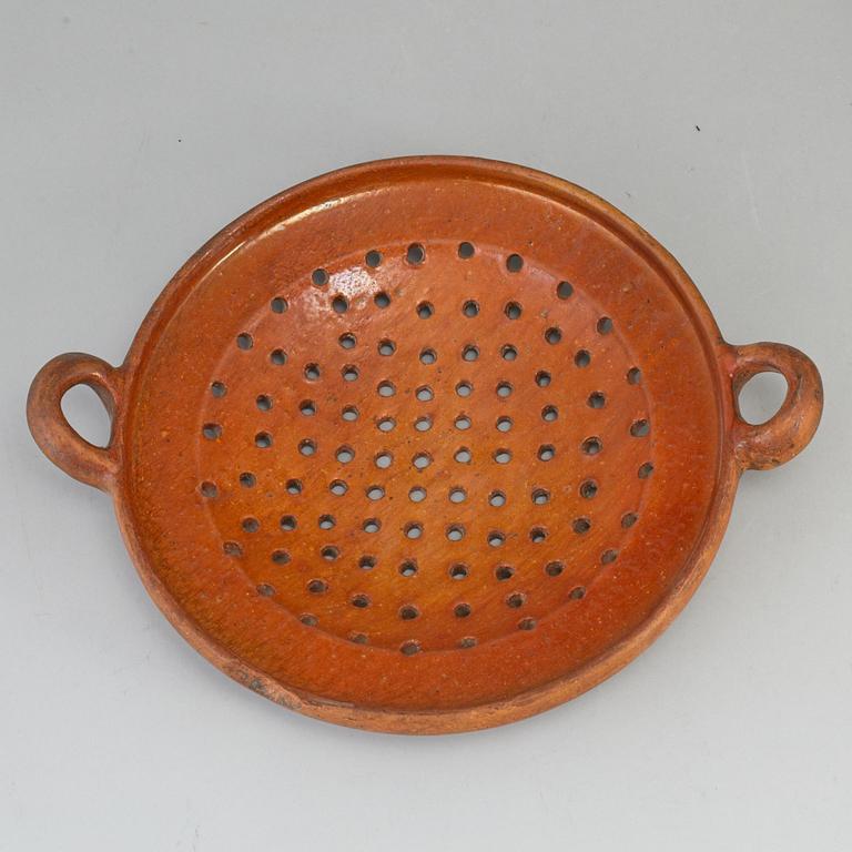 Two pottery strainers, 19th Century, Sweden.