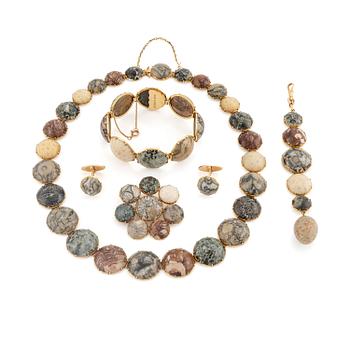 497. A parure in 18K gold with various rocks likely Swedish.