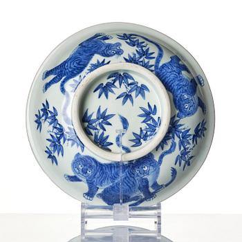 A rare Japanese Hirado ware dish with dragon and tigers, 19th century.