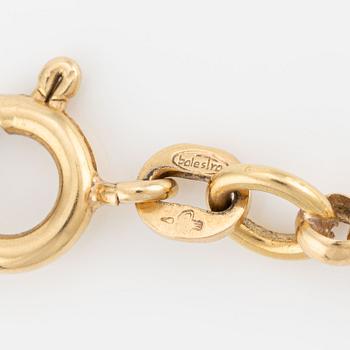 Öppningsbar medaljong med kedja, 18K guld.