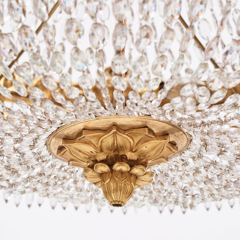An Empire twelve-light chandelier, early 19th century.