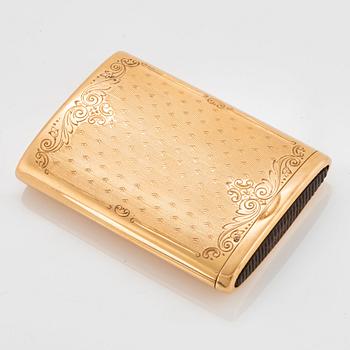 An 18K gold match box.