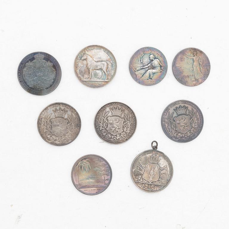 Medaljer, 9 st, silver, Kungl Myntverket, omkring år 1900.